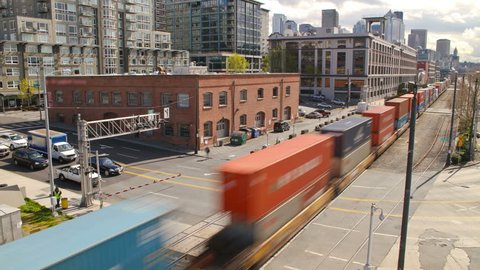 Time lapse clip of Seattle waterfront area with train going by.