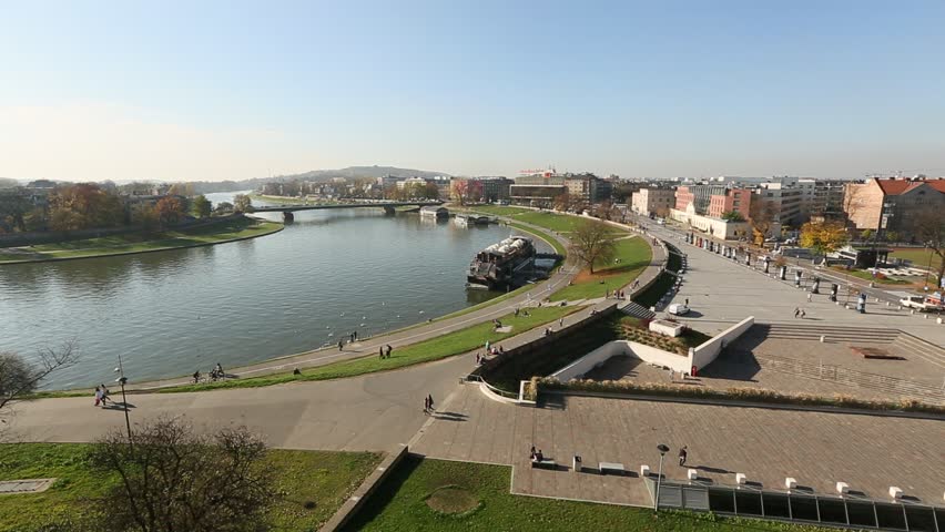 View of the embankment of Vistula River near Royal palace in Wawel in the