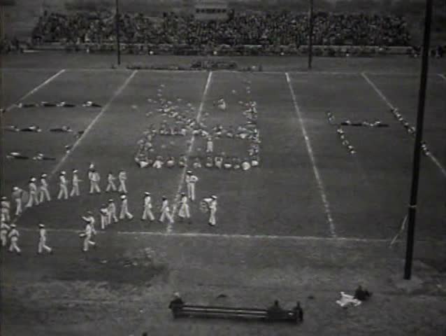 1930s - College football game in 1931 and halftime activities.