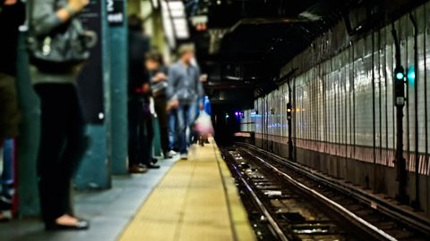 NYC subway time lapse clip of multiple trains.