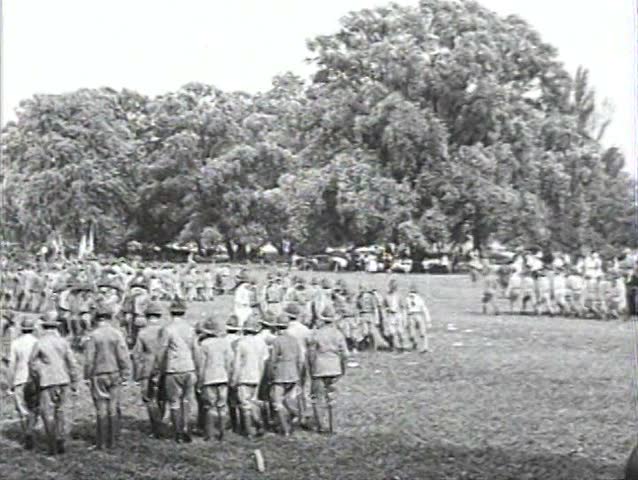 1920s - The Boy Scouts meet, march and earn merit badges in 1920.