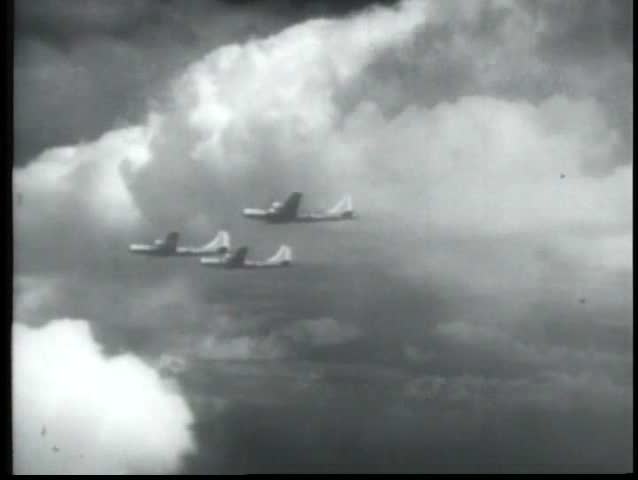 1940s - Air force B-29 bombers are prepared for a run over Saipan in World War II.
