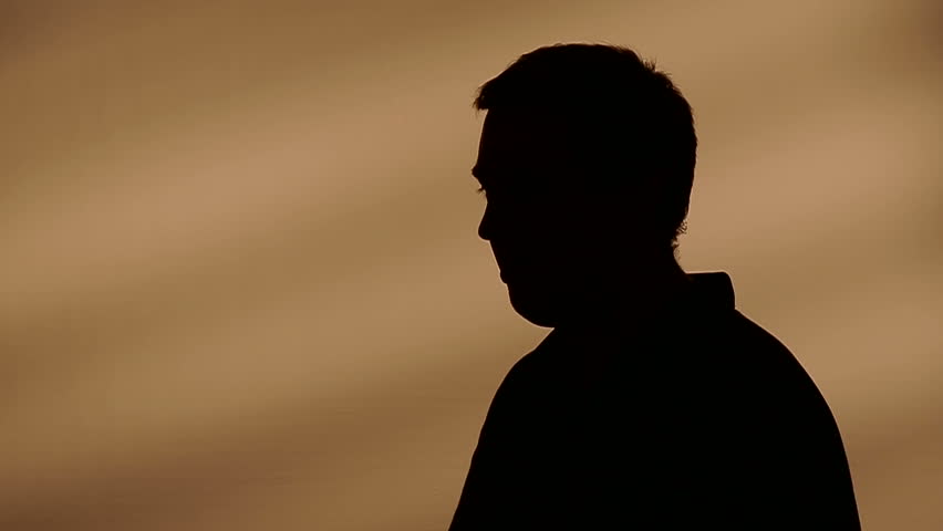 Male silhouette talking with hands | Shutterstock HD Video #4978949