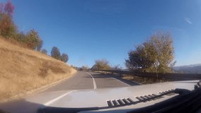 HD: On Mountain The Road - Stock Video. HD1080p: Driving on a winding mountain road, view from the front top of a car. Macedonia pov