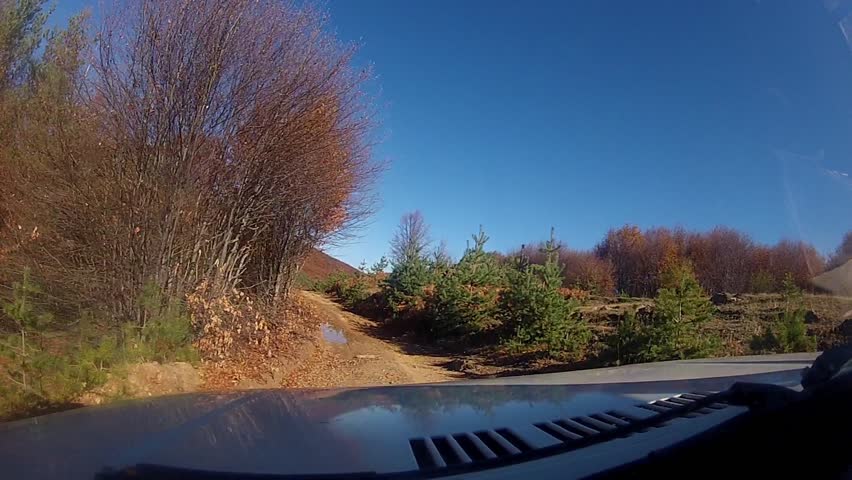 Off-road driving through a macedonian mountain forrest pov 