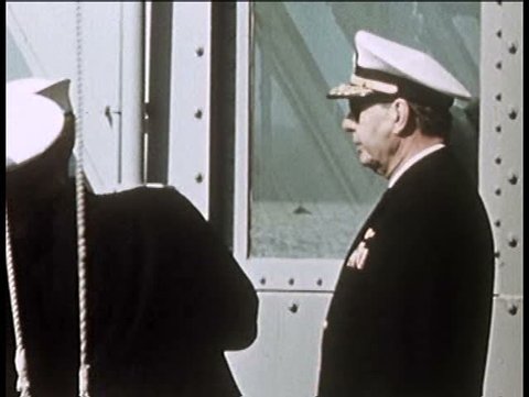 1960s - Briefing on board a Navy ship at sea and dignitaries visit men at sea.