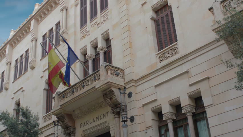 Balearic Parliament building with flags in front Palma de Majorca, Spain
