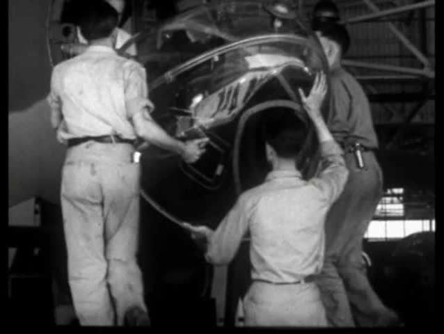 1940s - Final construction of a bomber in preparation for flight