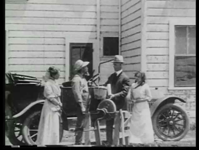 1920s - Mr. Power visits Mr. Work on the farm to convince him to use electricity on the farm.