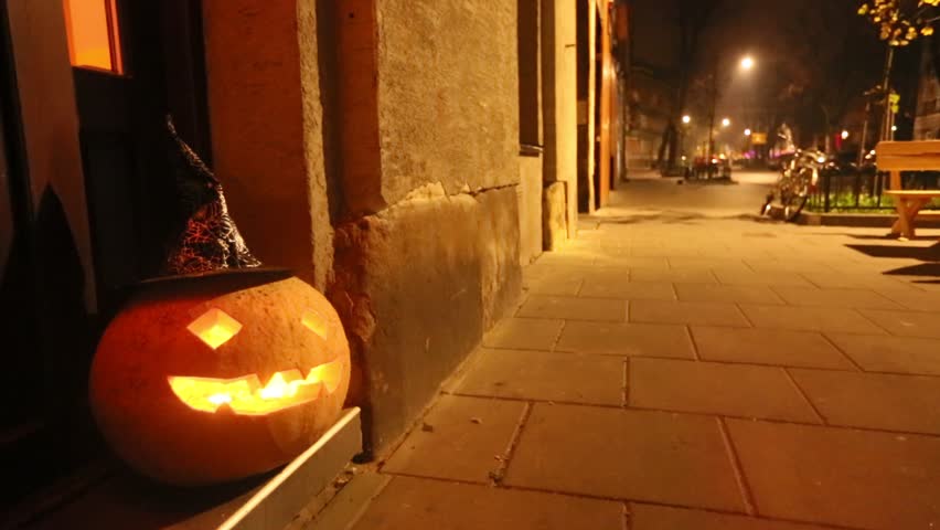 Jack-o-lantern - halloween pumpkin in the street. (HD)
