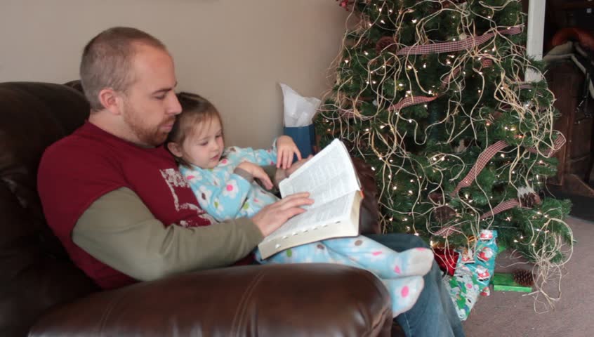 dad reads christmas story his daughter Stock Footage Video (100% Royalty-free) 4992932