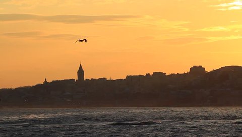 Sundown at Istanbul. In the distance are Galata Tower and the city silhouette.
