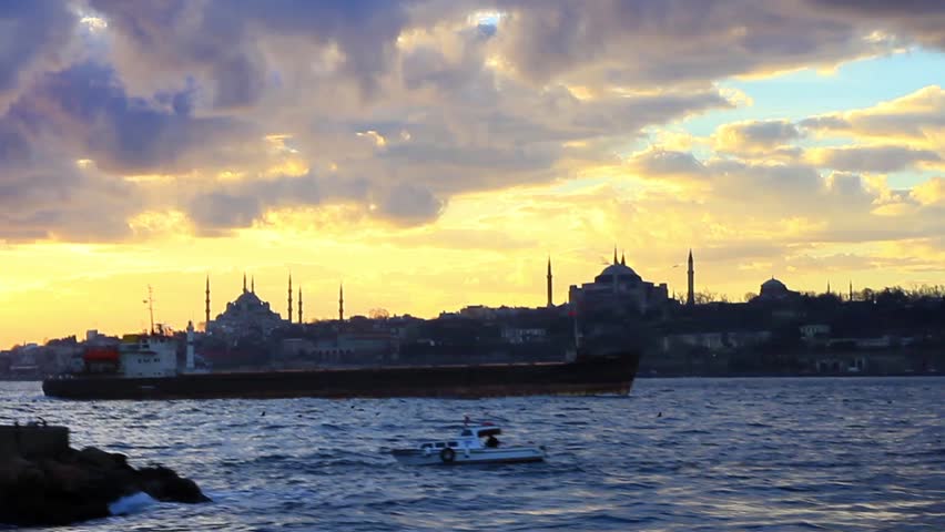 Sailing by the sunset in front of Historical Istanbul Peninsula. Winter Sunset