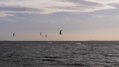 long shot of four kite surfers at brighton beach, victoria-recorded at 1080 60fps
