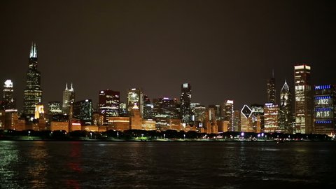 chicago skyline at night from adler planetarium