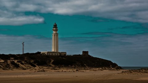 Time lapse of the trafalgar lighthouse in los cabos de meca, spain
