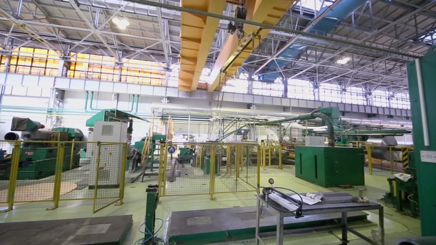 Overhead crane moves in large workshop with equipment for aluminum rolling at metallurgical factory Royalty-Free Stock Footage #5011706