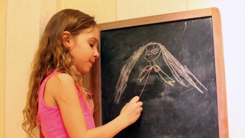 little girl draw on the chalkboard with colored chalks Royalty-Free Stock Footage #5015012