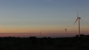 Clean and Renewable Energy, Wind Power, Turbine, Sillhouette Windmill, Energy Production at beautifull suntset HD 1080
