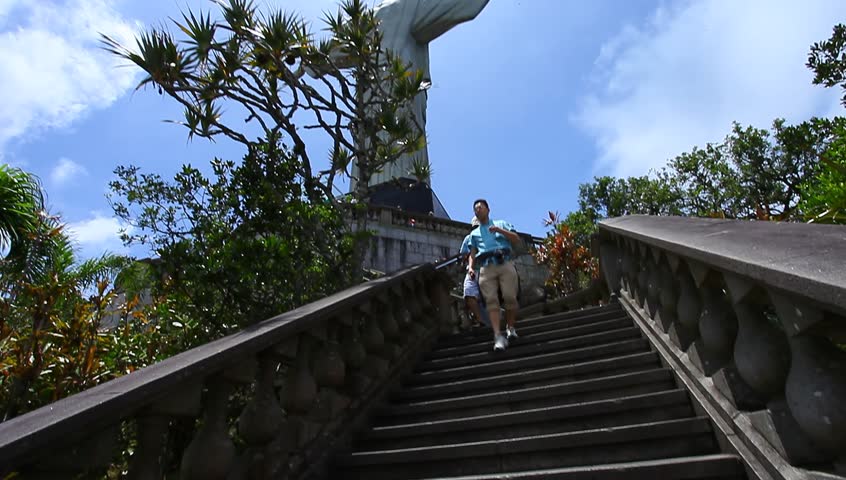 RIO DE JANEIRO - 2013: Tourists visit Christ the Redeemer, Corcovado, meaning