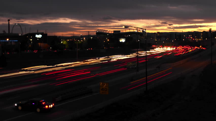 Busy interstate highway in Denver, Colorado. Motion dolly. HD 1080p time lapse.