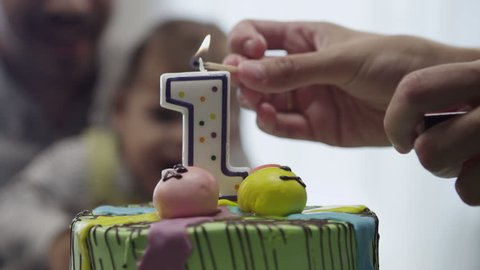 Mommy father and child first birthday party Stock Video