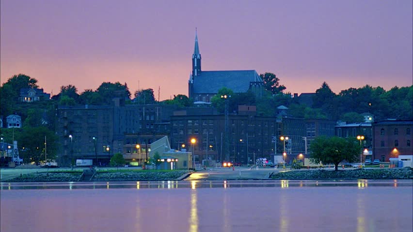 Burlington, Iowa - Small town. night scene. locked off shot looking across Mississippi river.