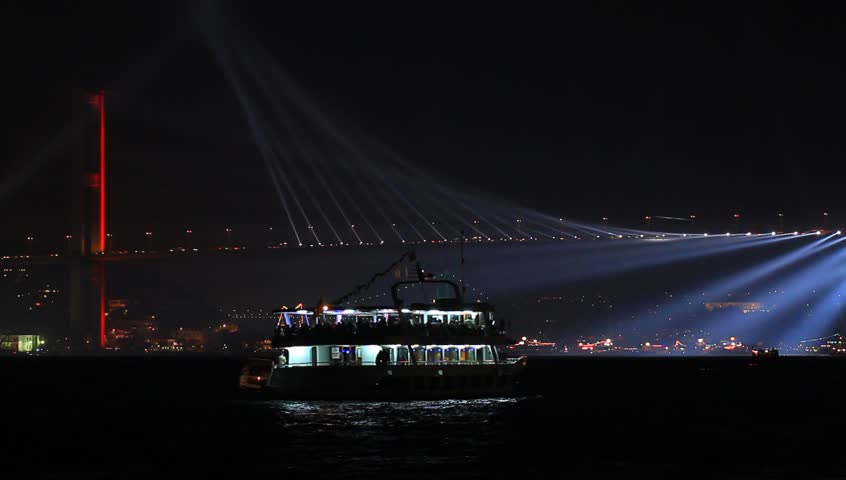 Light beams over the Bridge. Istanbul celebrates to Anniversary of Republic with