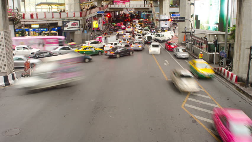 BANGKOK, THAILAND - NOVEMBER 8, 2013: Time lapse of a busy intersection by the