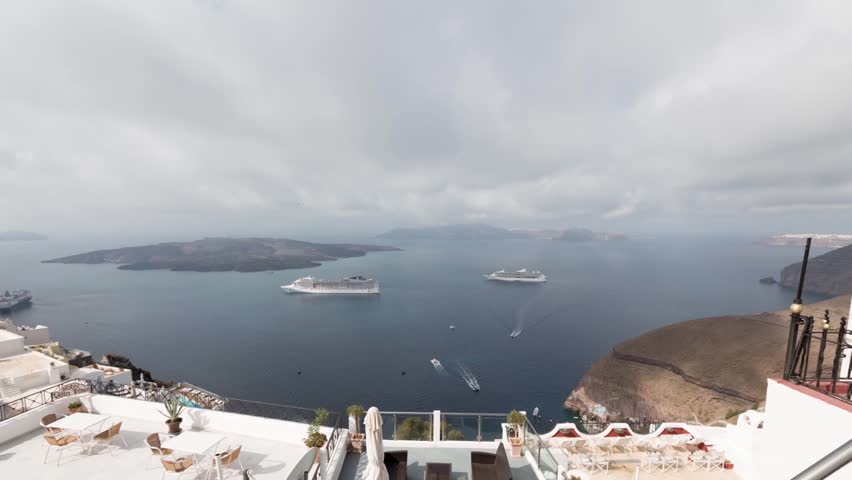 Time-lapse of clouds and movement of ships, the bay of Santorini, Greece