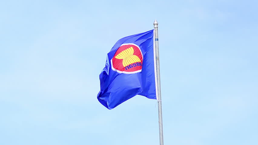 Asian symbol flag over blue sky 
