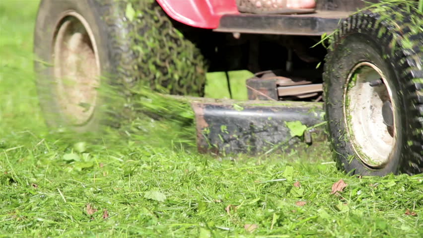 red lawn tractor mower has big Stock Footage Video (100% Royalty-free ...