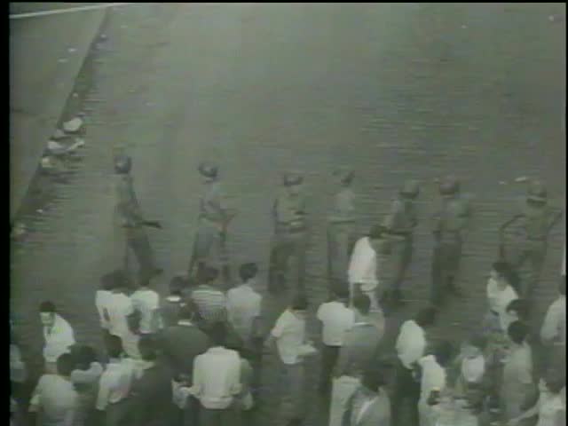 Riot police stand guard on during  the military coup against President Joao Goulart, Brazil, circa April, 1964 - MGM PICTURES, UNIVERSAL-INTERNATIONAL NEWSREEL, USA, USA, filmed in 1964 