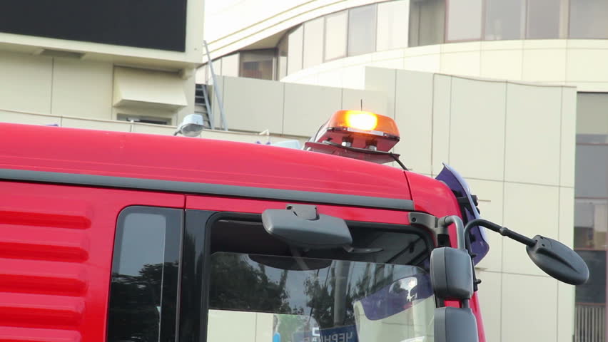 Emergency orange lights on top of truck car, road service