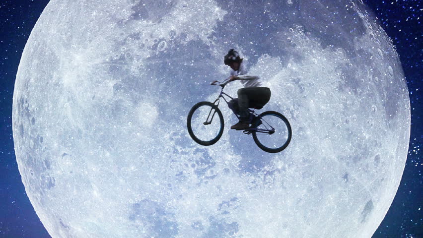 Moon bicycle slow motion, male bike flies across night sky