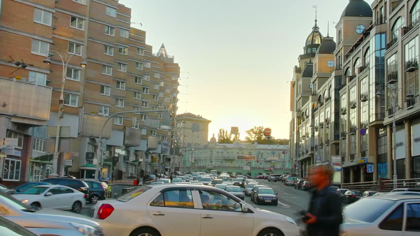 Dusk city traffic jam, street vehicles cars stuck time lapse
