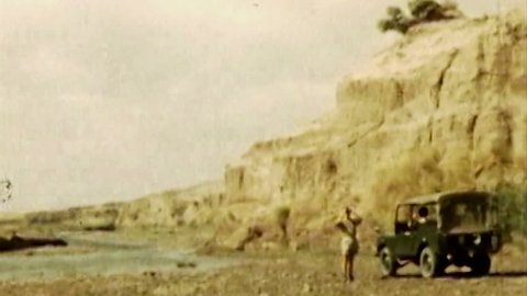 ADEN, CIRCA 1960: Aden Protectorate British Land Rover desert vintage HD. British Aden Protectorate in southern Arabia. One of a kind private owned vintage and historic 8mm film. Republic of Yemen.