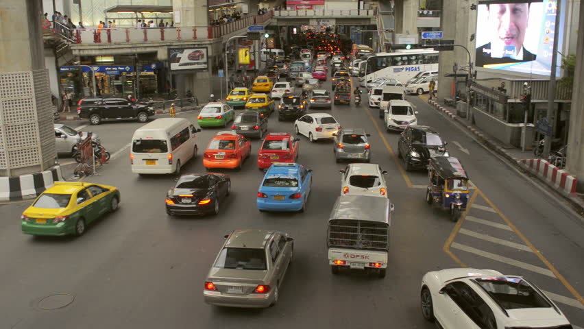 BANGKOK, THAILAND - NOVEMBER, 2013: Busy intersection by the Siam skytrain