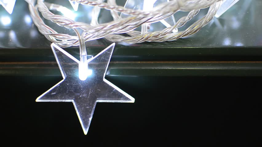 Glowing Christmas Star Ornaments - Stock Video. Completely Loopable Star