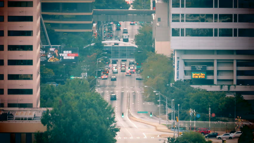 Time lapse of traffic flow of tiny cars through the streets of Atlanta Georgia