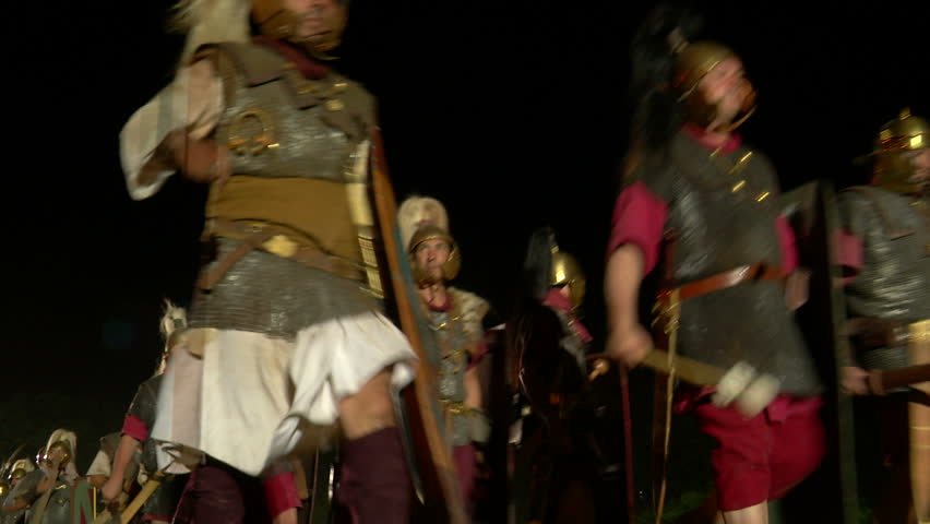 AQUILEIA - JUNE 22: Reenactment of roman legion marching against gaulish army