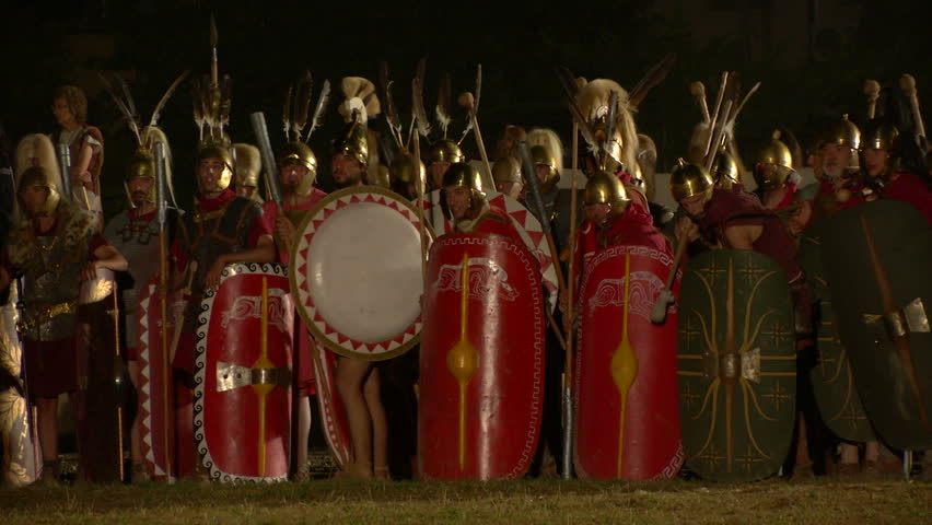 AQUILEIA - JUNE 22: Reenactment of roman legion marching against gaulish army