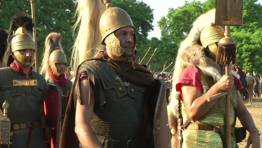 AQUILEIA - JUNE 23: Reenactment of roman legion marching against gaulish army