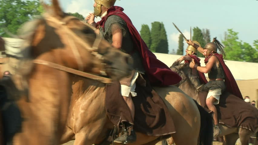 AQUILEIA - JUNE 23: Reenactment of the battle between gaulish and roman cavalry