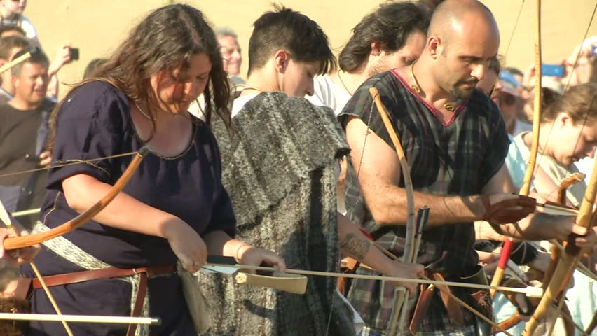 AQUILEIA - JUNE 23: Reenactment of the attack by gaulish archer against the