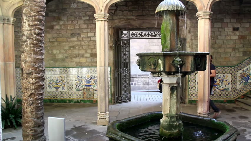 Water flowing out from a mossy fountain. The beauty and the calmness of the fountain makes it so relaxing to stand by.