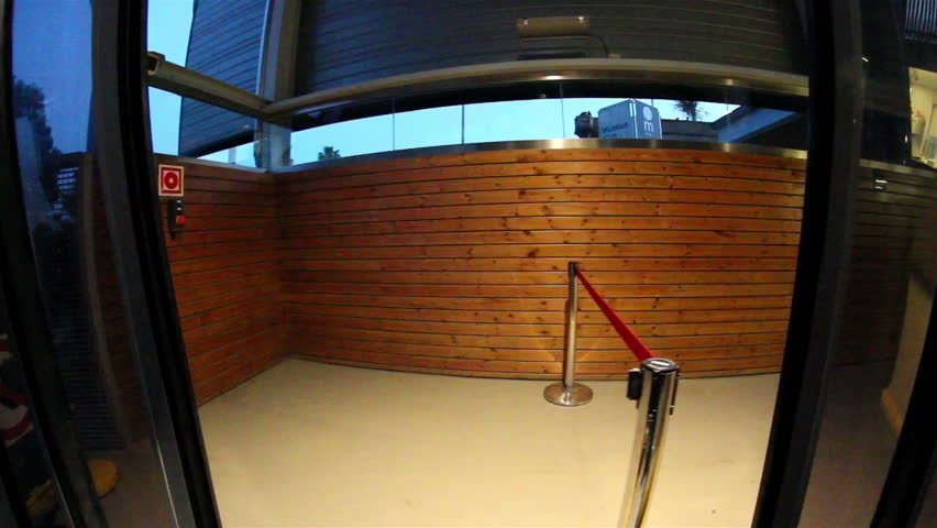 Cable car stopping in the station to unload the riders as well as pick up passengers and take a ride.