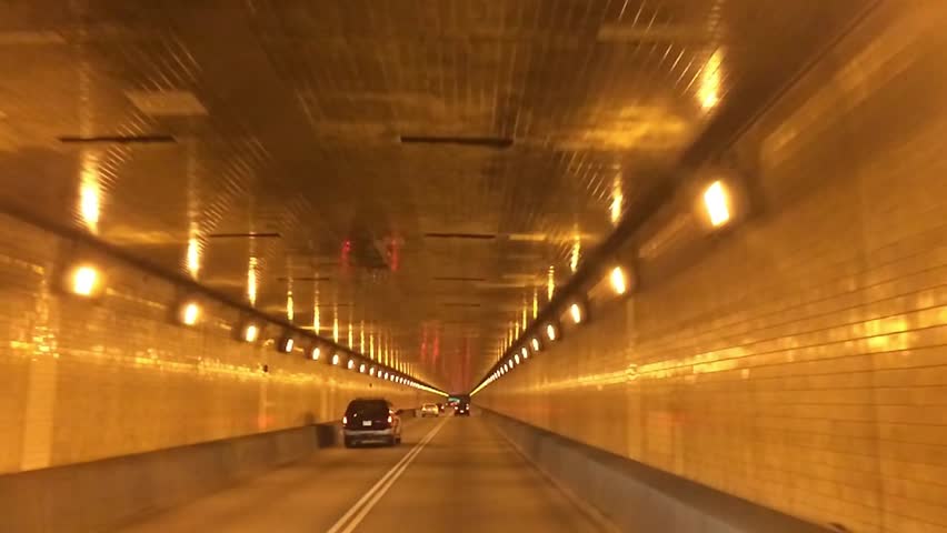 A driver's perspective of traveling through the Fort Pitt Tunnel in Pittsburgh,