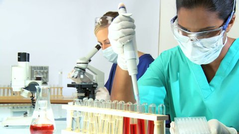 Medical professionals working in laboratory