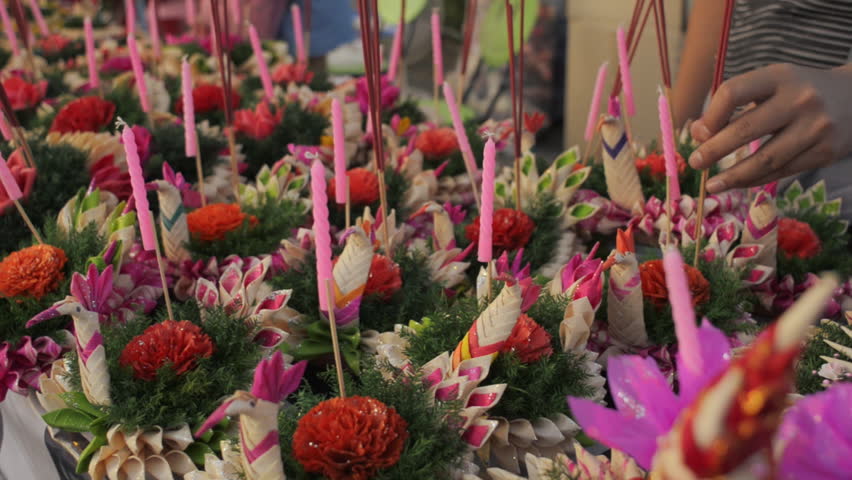 Decorative krathong rafts laid out ready to sell, at a stall during the Loi